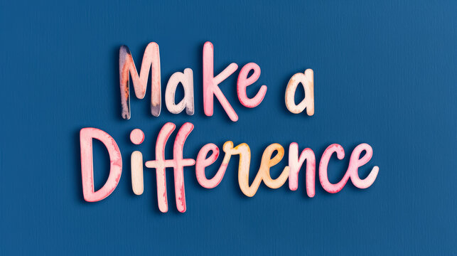 Watercolor text Make a Difference isolated on a solid dark blue background 