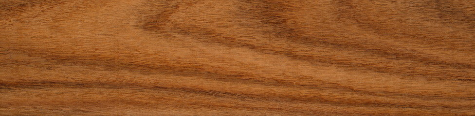 Rich, textured santos rosewood or palisander wooden surface showcasing natural patterns and warm tones