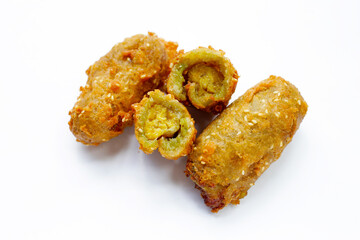 Deep-fried banana rolls with unripe rice grain