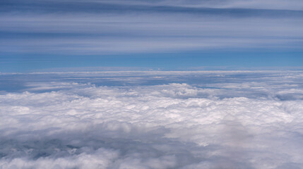 Obraz premium Blue Sky with White Clouds, Flying above Sunny Cloudy Sky Texture Pattern, Fluffy Clouds Plane View