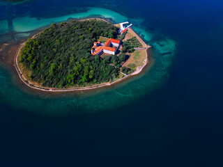 Drone view of the Kosljun island with Franciscan monastery from 1447. Beautiful Adriatic coast in...