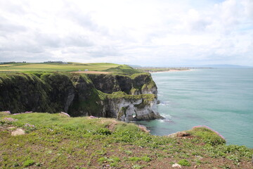 Rugged north coast at Dunluce Castle in Northern Ireland  