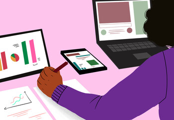 Woman analyzing data on devices and document at desk