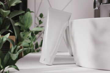 Tube of cream by the sink mockup. 3D rendering