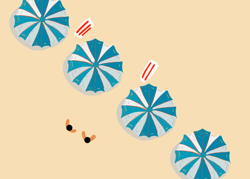 Blue umbrellas on sand at beach