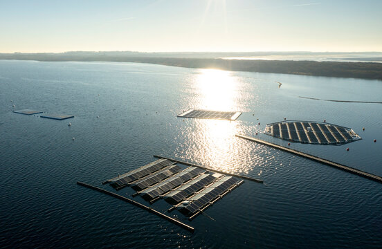 Experimental floating solar farms on lake at sunny day in Netherlands