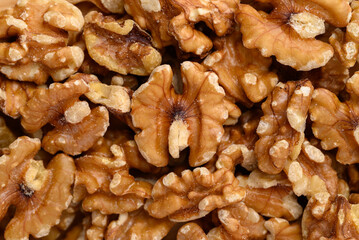 Organic raw walnuts texture background, food ingredient