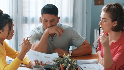 Top down view of project manager present idea while holding tablet at meeting. Skilled business team discussing and planning marketing strategy. Group of interior designer choosing idea. Symposium.