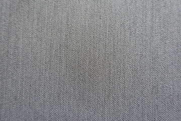 light gray polyester fabric with herringbone pattern from above
