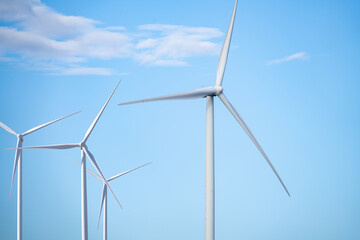 Wind energy. Wind power. Sustainable, renewable energy. Wind turbines generate electricity. Wind farm. Sustainable resources. Sustainable development. Green technology for energy sustainability.