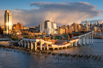New York City, Little Island public park at sunset. Elevated park with amphitheater at Hudson River Park (Pier 55), Greenwich Village, Manhattan