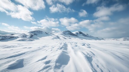 Snow in the mountain, blue sky with white clouds, powder snow