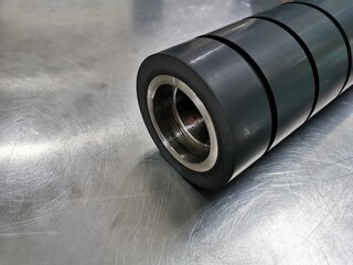 Black NBR rubber rollers are used in the film industry, plastic industry, conveyor, steel, paper, and wood.