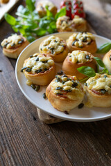 Hearty filled yeast rolls with ham, cheese and pumpkin seeds. Delicious party food or snack