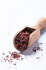 Dried spice sumac - popular ingredient in Middle Eastern cuisine.