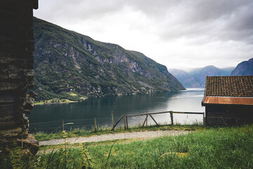View of the Aurlandsfjorden Fjord seen from Otternes "klyngetun" of the fjord of Sognefjorden, Western Norway, the traditional Norwegian village, of June 2024.