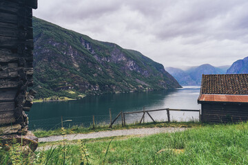 View of the Aurlandsfjorden Fjord seen from Otternes "klyngetun" of the fjord of Sognefjorden, Western Norway, the traditional Norwegian village, of June 2024.