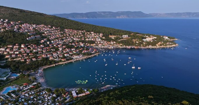 Aerial view around the bay of Rabac, sunny, summer evening in Istria, Croatia