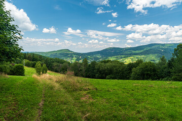 Obraz premium Beautiful view from hiking trail betwen Loucka and Poledni hills in Slezske Beskydy mountains in Czech republic