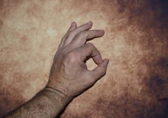 a man's hand with the ok sign