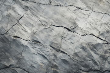 Obraz premium Processed collage of grey mountain cliff rock stone surface texture. Background for banner