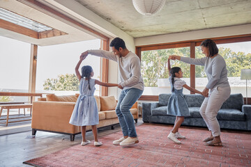 Dancing, parents and girls in living room, home and bonding with children, teaching and lesson for youth. House, man and woman with kids, fun and games in weekend, learning and family together