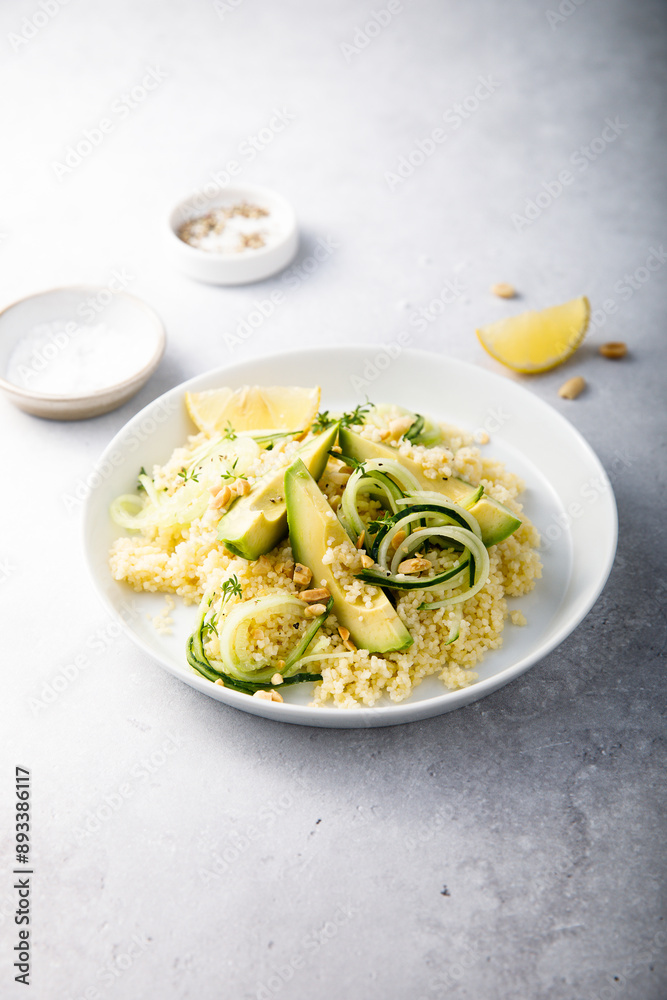 Wall mural Lemon couscous with avocado and cucumber