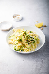 Lemon couscous with avocado and cucumber