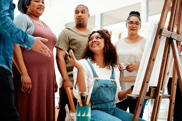 Art class, painting and woman mentor at easel, talking and teaching at creative workshop. Female person, team building and artist bonding in crafts studio, tutor and canvas for skill or education