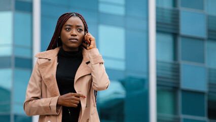 Upset frustrated young woman receiving email reading bad news on smartphone receives notice...