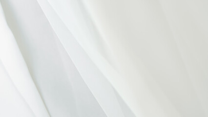 Obraz premium Elegant white tulle background for home textiles and wedding dress fabric