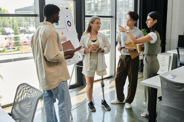 A group of colleagues discuss ideas during a meeting in an office setting.