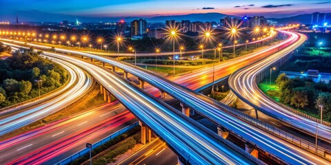 Fototapeta premium Cityscape with highway overpass and light trails at dusk