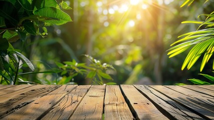 Wood tabletop podium floor in outdoors tropical garden forest blurred green leaf plant nature background