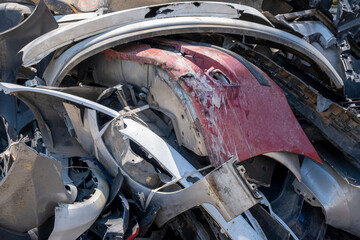Scrap plastic car bumpers at the recycling center