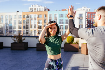 Motivation, high five and support with couple and fitness training for health, workout and goals in outdoor.