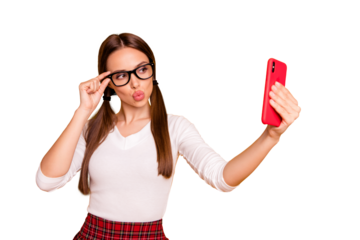 Portrait of her she nice-looking attractive lovely sweet gorgeous charming cute girl holding in hand camera making taking selfie touching glasses isolated on bright vivid shine yellow background
