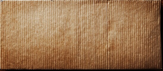 Background with a textured brown paper box carton pattern ideal for copy space image