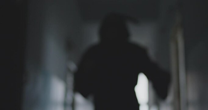 Halloween Grim Reaper horror moving in black cosplay scary costume, Angel of Death harvesting souls, hooded cape, skull face mask, skeleton gloves for theme party spooky gothic ball event for fear