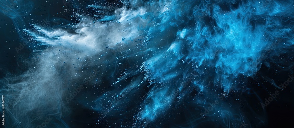 Aufkleber freeze action of blue powder bursting on a dark background, forming an abstract white dust cloud exp