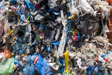 Pressed plastic waste to be recycled