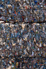Pressed plastic waste to be recycled