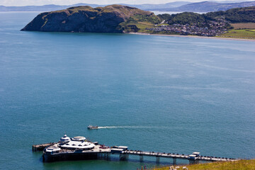 A view of Llandudno, featuring the Grade I Listed pleasure pier, bay & Little Orme, Crueddyn...