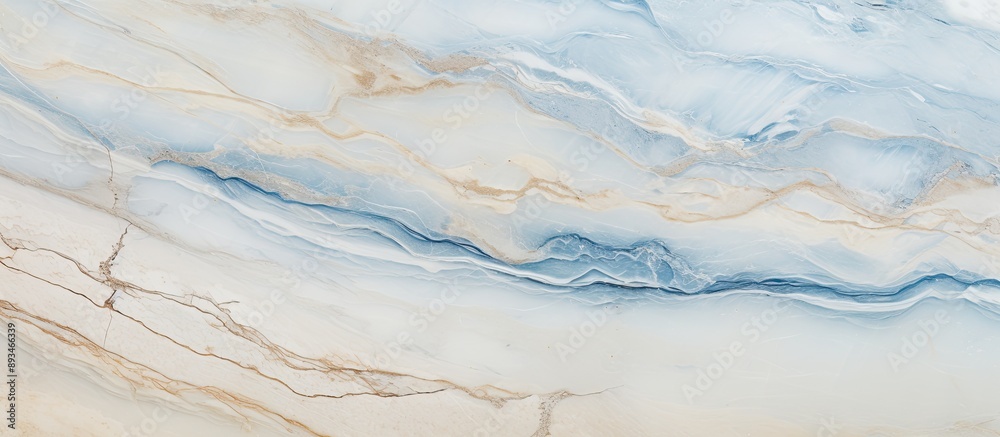 Aufkleber Flat lay top view of a beige marble background with blue textured lines, providing ample copy space image.
