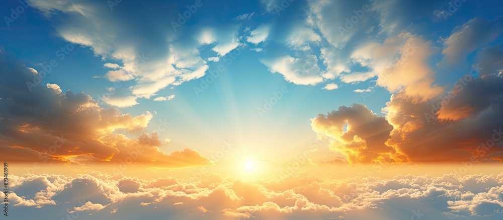 Poster golden clouds illuminated by the evening sunlight against a blue sky provide a tranquil ambiance in 