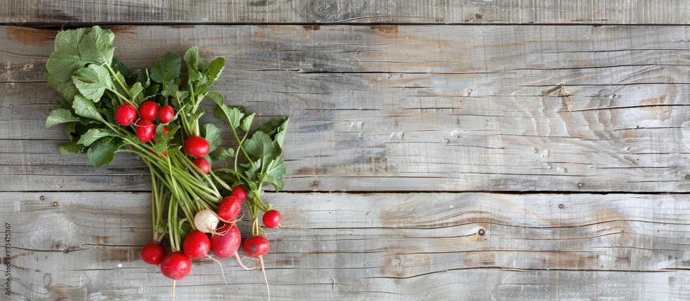 Aufkleber Top down view of a radish bunch displayed on a wooden surface with ample copy space for additional elements in the image