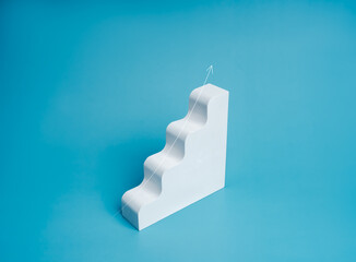 Business growth performance concept. Rising curve arrow on modern white geometric stair four steps...