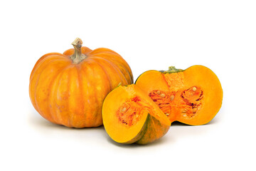 Fresh whole, half and sliced nutmeg pumpkins on a white background with space for text