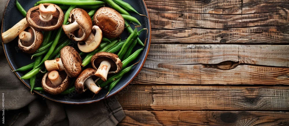 Poster Table set with delicious mushrooms and green beans on a plate with copy space image