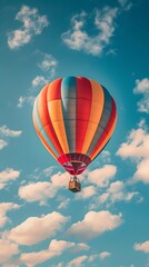 Obraz premium Brightly Colored Hot Air Balloon Soaring Into the Sky Symbolizing New Beginnings and Opportunities
